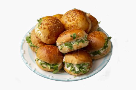 Photo for Turkish pastry filled with dill, parsley, cream cheese and cheddar cheese. Turkish name: Sakall Pogaca or Sacakil Pogaca - Royalty Free Image