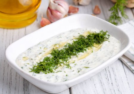 Haydari is a type of yogurt made from certain herbs and spices, combined with garlic. Turkish cuisine.