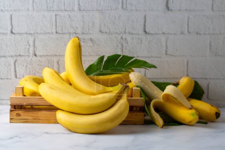 Photo for Bunch of Raw Organic Bananas Ready to Eat - Royalty Free Image