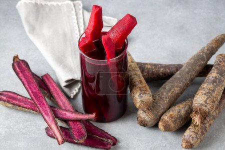 Photo for Salgam or fermented beet juice. Popular Turkish drink. Traditional beverage made with water, purple carrot or turnip (juice). - Royalty Free Image
