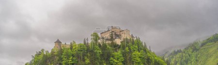 Photo for Hohenwerfen Castle stands on a crisp in the Alps mountains in austria - Royalty Free Image
