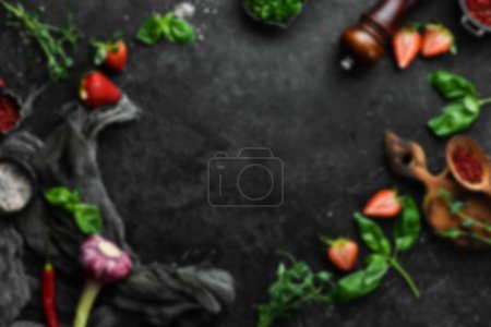 Photo for Defocused food background. Set of organic food, spices and herbs. Top view. Free space for your text. - Royalty Free Image