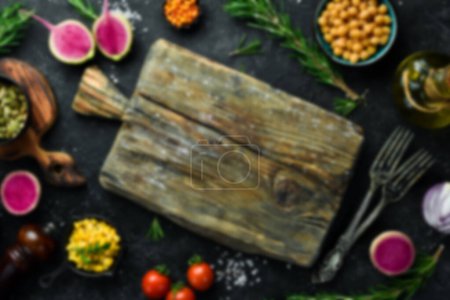 Photo for Defocused food background. Set of organic food, spices and herbs. Top view. Free space for your text. - Royalty Free Image