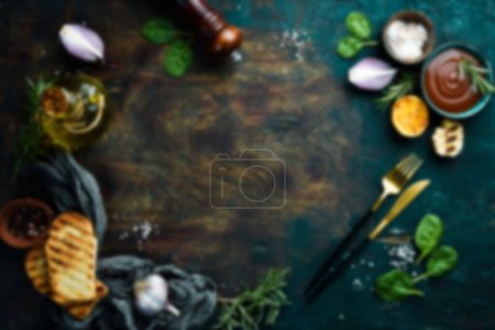 Photo for Defocused food background. Healthy food. Vegetables and fruits and food. On a black wooden background. Top view. Copy space. - Royalty Free Image