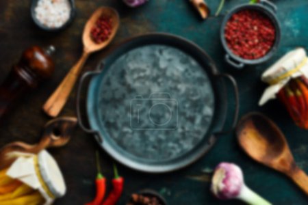 Photo for Defocused food background. Healthy food. Vegetables and fruits and food. On a black wooden background. Top view. Copy space. - Royalty Free Image