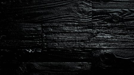 Photo for Wooden background charred by fire. Black texture banner. Free space for text. Top view. - Royalty Free Image