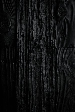 Photo for Black wooden texture background. Vertical photo. Top view. - Royalty Free Image