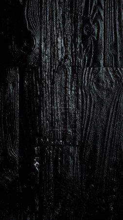 Photo for Black wooden texture background. Vertical photo. Top view. - Royalty Free Image