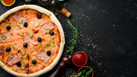 Photo for Pizza with bacon, cucumber and olives. Food delivery. Free space for text. - Royalty Free Image