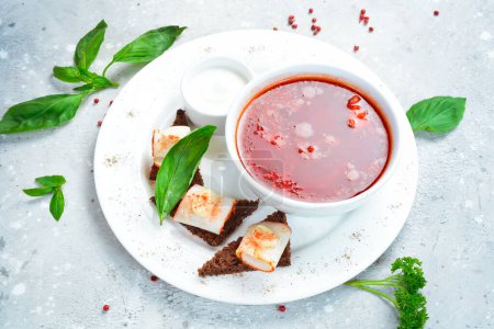 Photo for Beet soup. Ukrainian traditional borscht with lard and croutons. Top view. Free space for text. - Royalty Free Image