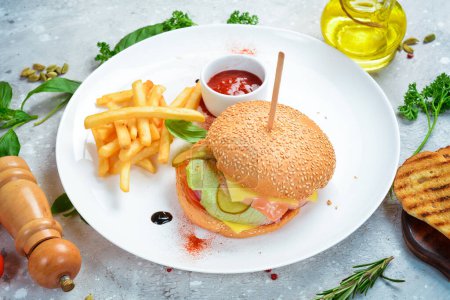 Photo for Burger with french fries and sauce. Top view. Free space for text. - Royalty Free Image