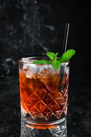 Photo for Whiskey sour cocktail, a classic alcoholic drink on a black background. Bar menu. - Royalty Free Image