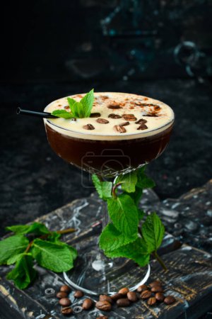 Photo for Summer cocktail and bar concept. Fresh alcoholic cocktail with coffee liqueur and coffee beans and ice. Bar menu. - Royalty Free Image