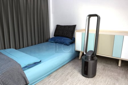 modern design black color bladeless purifying tower fan is on the nice floor of the nice modern bedroom to create fresh cool air ambient in the summer