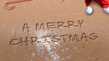 Photo for Merry Christmas from the Beach features waves washing up on a sandy beach and leaving behind a Merry Christmas message written in the sand, Not A.I. generated. - Royalty Free Image