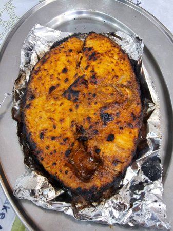 Arabic style grilled King mackerel fish .
