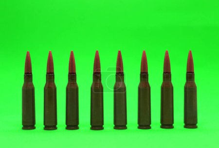 Téléchargez les photos : Bullets In Line On Green Screen Stock Photo - en image libre de droit