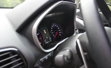 Photo for Steering Wheel, Shifter And Backlight Of Central Dashboard Inside Car Detailed Side View - Royalty Free Image
