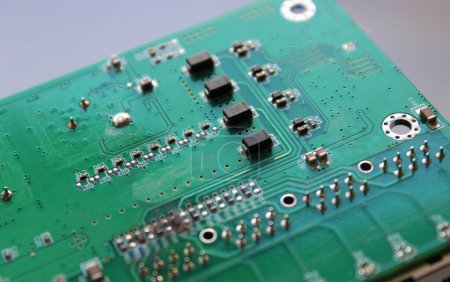 Photo for Row of identical microcontrollers soldered into an electronic board - Royalty Free Image