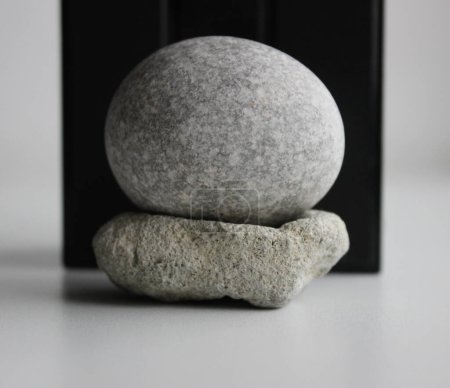 Photo for Zen Tranquility Idea. Perfect Smooth Stone On Black And White Background - Royalty Free Image
