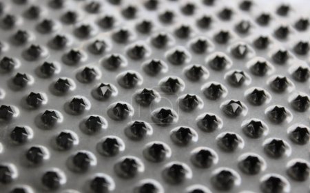 Pattern Of Perforated Metal Food Grater Surface Detailed Photo 