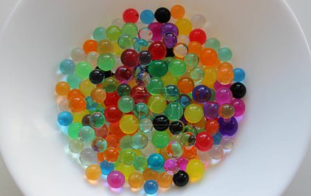Heap Of Colorful Orbeez Balls Inside White Bowl 