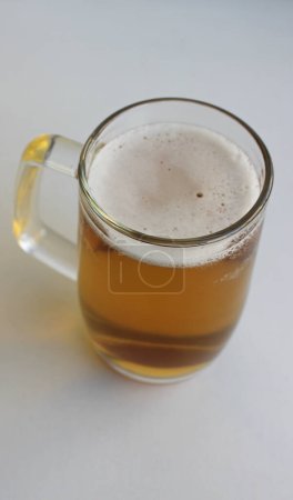 Full Glass Of Classic Lager Beer With Thin Layer Of Foam Stock Photo For Vertical Story 