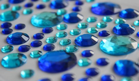 Pattern Of Scattered Variety Round Blue Glass Strasses With Faceted Edges Detailed Stock Photo