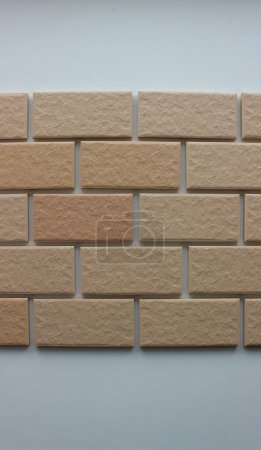 Straight Lines Of Tiles In Form Of Bricks On White Wall Surface 