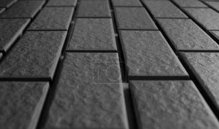 Wall tiles receding into the distance are arranged in even rows. Black and white vertical photo for wall pattern backgrounds