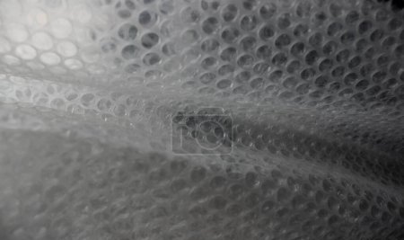 Estructura del material de embalaje de burbujas de polietileno. Foto de stock sobre el paquete y materiales a prueba de golpes