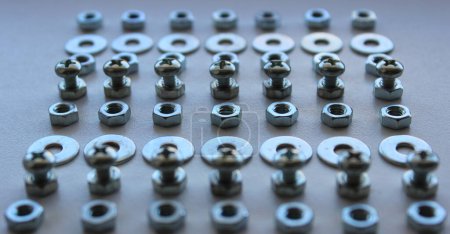 Variety Fixing Hardware Laid Out In Straight Lines Angle View Closeup Stock Image