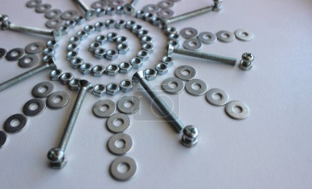 Flower Pattern Of Laid Out Different Fixing Hardware Detailed Stock Photo