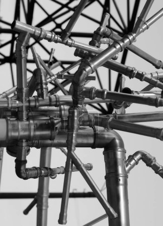 Chaotische Struktur des Dark Iron Pipe Network. Archivfoto zur Illustration des Rohrtransports