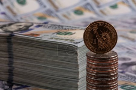 Photo for American coins and banknotes in denominations of 100 American dollars - Royalty Free Image