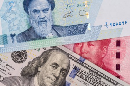 Photo for Fragments of banknotes of 100 Chinese yuan , 2-2000 Iranian tuman-reals, 100 USD - Royalty Free Image