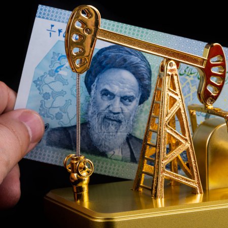 Photo for Fragment banknote of  2-20000 Iranian tuman-reals with portraits of Ruhollah Khomeini and golden oil pump - Royalty Free Image