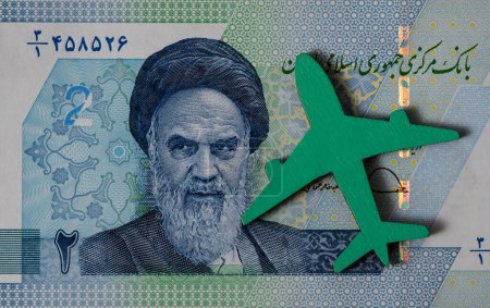 Photo for Symbolic plane against the background of Iranian banknotes - Royalty Free Image