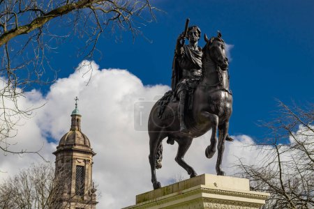 Photo for Statue of william the third in centre of Glasgow, scotland on a sunny day. Person on a horse pointing towards the camera. - Royalty Free Image