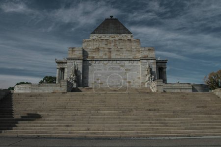 The Shrine of Remembrance in Melbourne - Australia, Victoria, on a sunny day with some clouds. Scenic view of Shrine of Remembrance, looking from the side stairs.