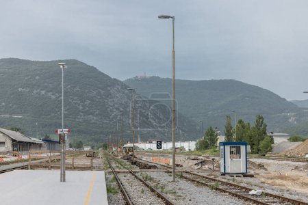 Train station of Nova Gorica during the renovaton. Construction of new platforms and train tracks as part of 2025 european culture capital. workers doing their best to refreshen the station