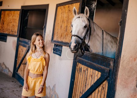 Photo for Person with horse. horse in stable - Royalty Free Image