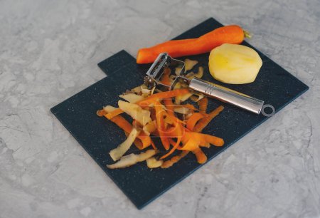 Photo for Waste Based Cooking. Elevated View Of Vegetable And Fruit Peelings On Table - Royalty Free Image