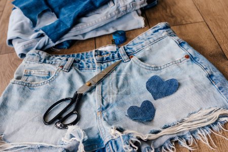 Photo for Recycle, reuse, repurpose, upcycle, upgrade concept. New life to old things, make your own clothes from jeans - Royalty Free Image