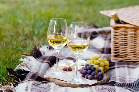 Photo for Wine, fruit, cheese at picnic - Royalty Free Image