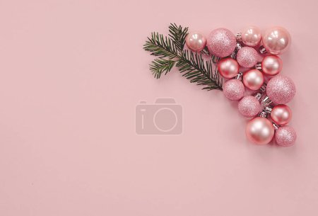 Photo for Christmas composition. Christmas pink decorations on pastel pink background. Flat lay, top view, copy space - Royalty Free Image