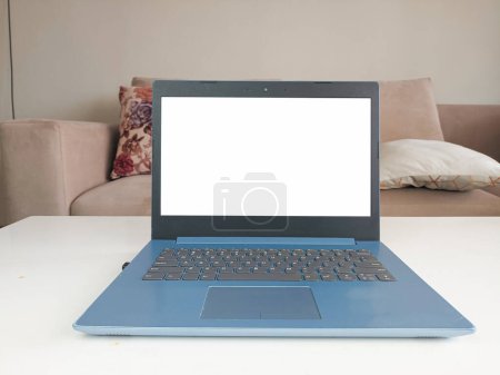 Photo for Mockup image, white blank screen laptop computer on the front display in modern home space. mockup laptop - Royalty Free Image