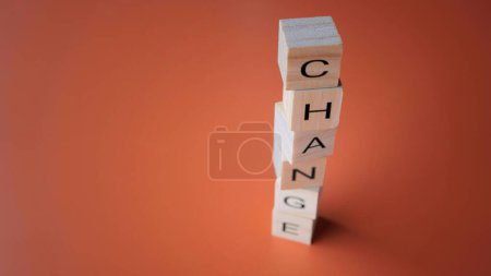 Photo for Wooden cubes with text CHANGE. Copy space for text. Adapting to change, improvement and development concept - Royalty Free Image