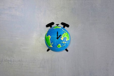 Drawing of alarm clock and world globe with copy space. Earth hour, earth day and time zone concept.
