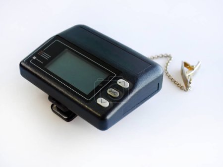 Photo for Side view, Vintage model of Wireless telecommunication, pager, paging, message device, communication, beeper, isolated on white background - Royalty Free Image